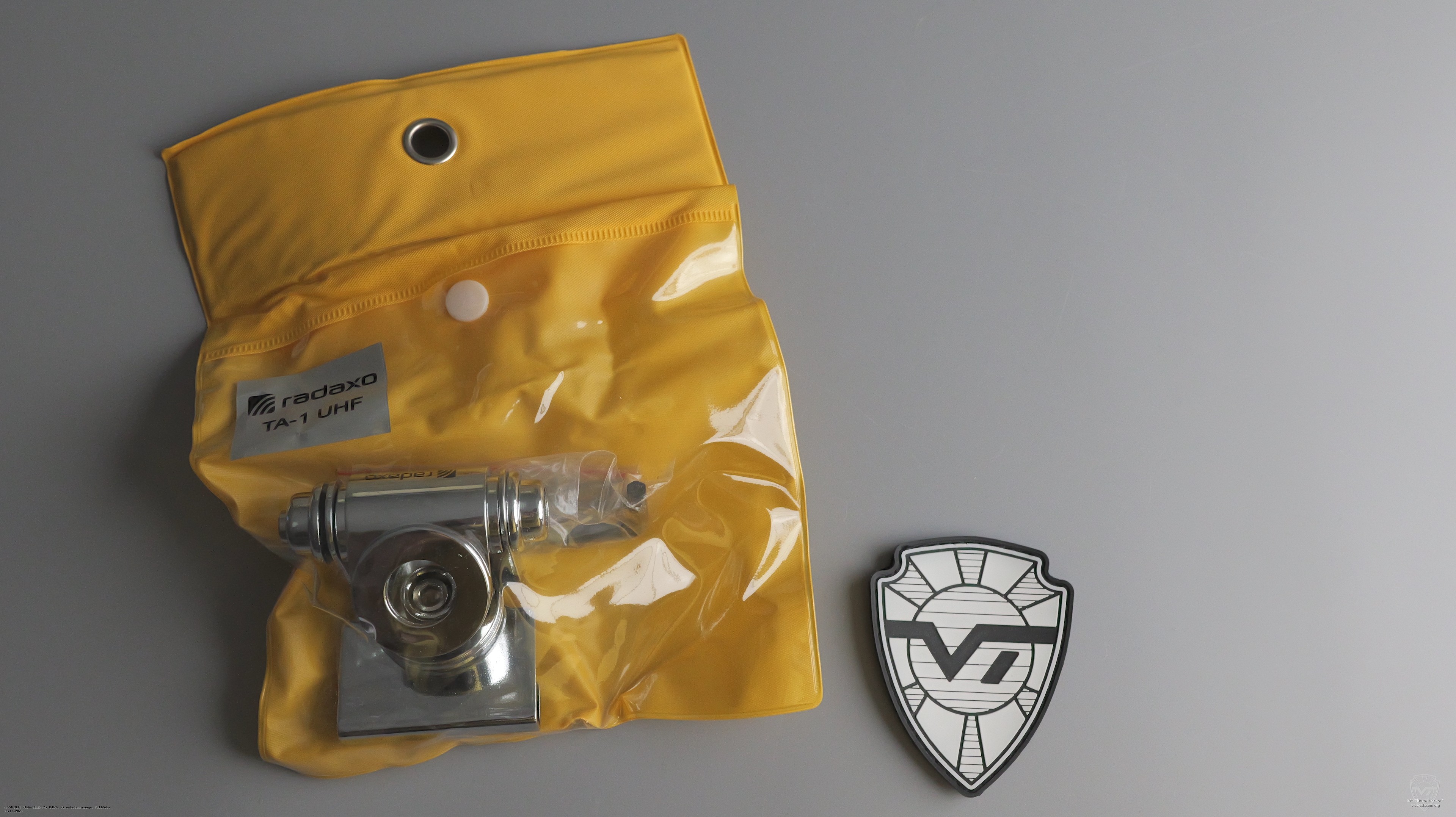 Упаковка крепления Radaxo TA-1UHF. Radaxo TA-1UHF Упаковка крепления Radaxo TA-1UHF